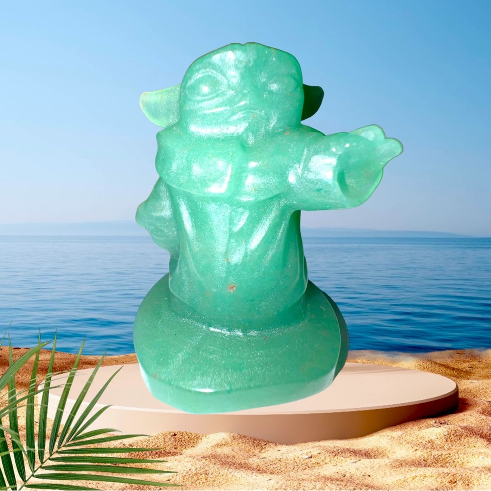 Natural Green Aventurine crystal stone figurine carving.